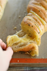Hasselback Garlic Cheesy Bread by Lauren